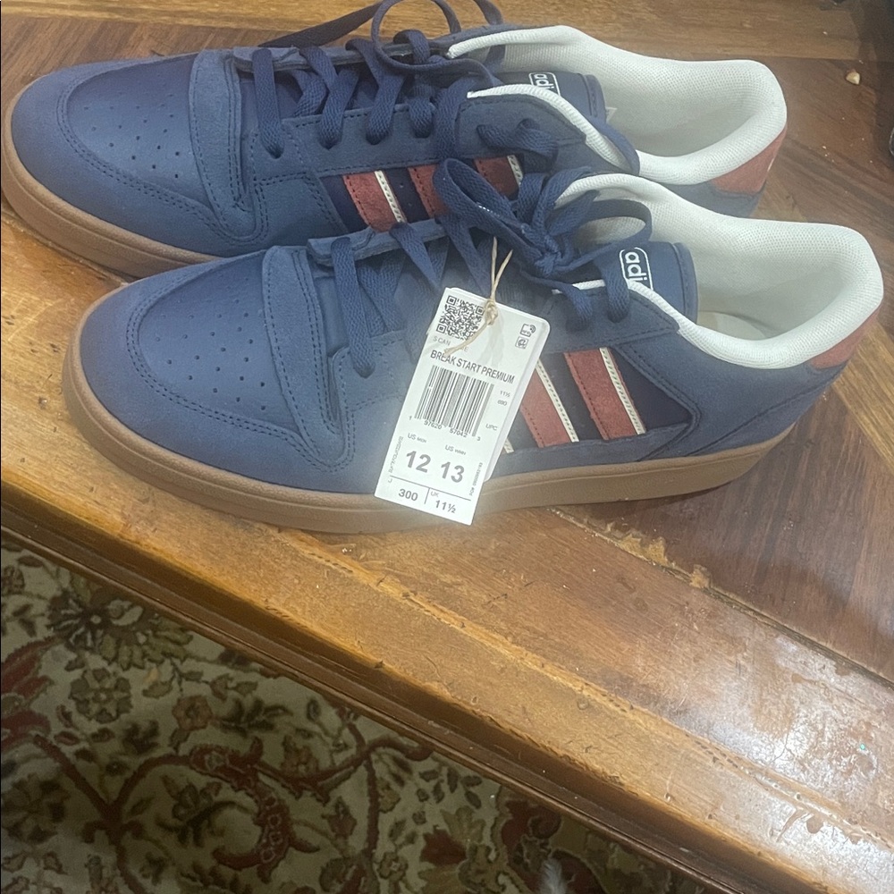 Adidas Break Start Premium (New)

Adidas Men's Blue Sneakers with Red Accents